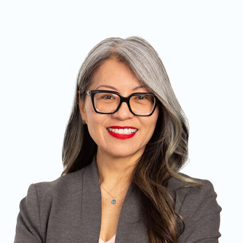 Leni smiling at the camera